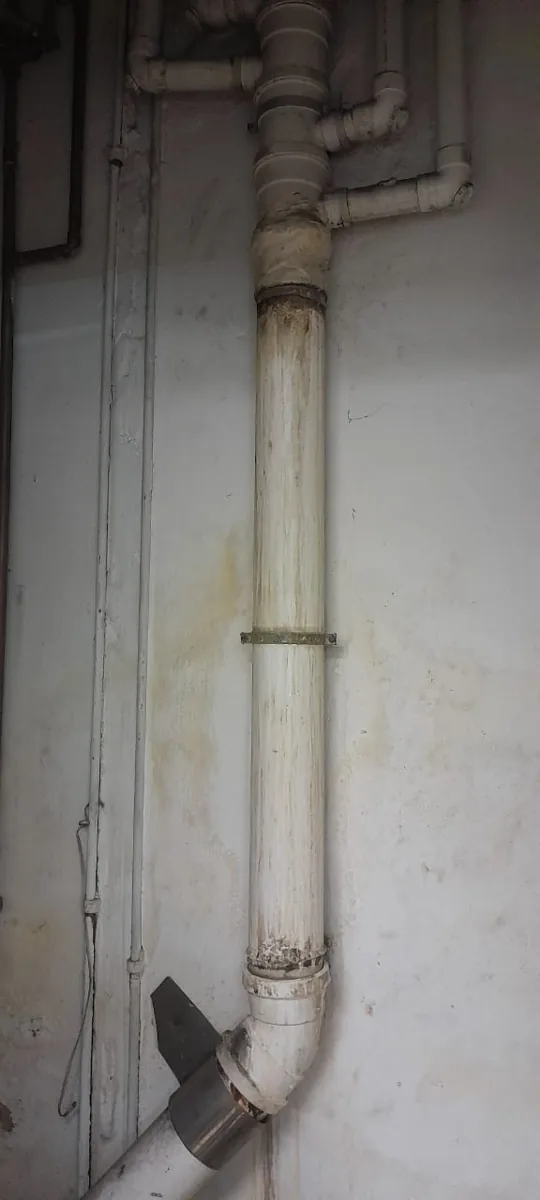 Apartment stack blockage and stained vertical waste pipe in Sandton