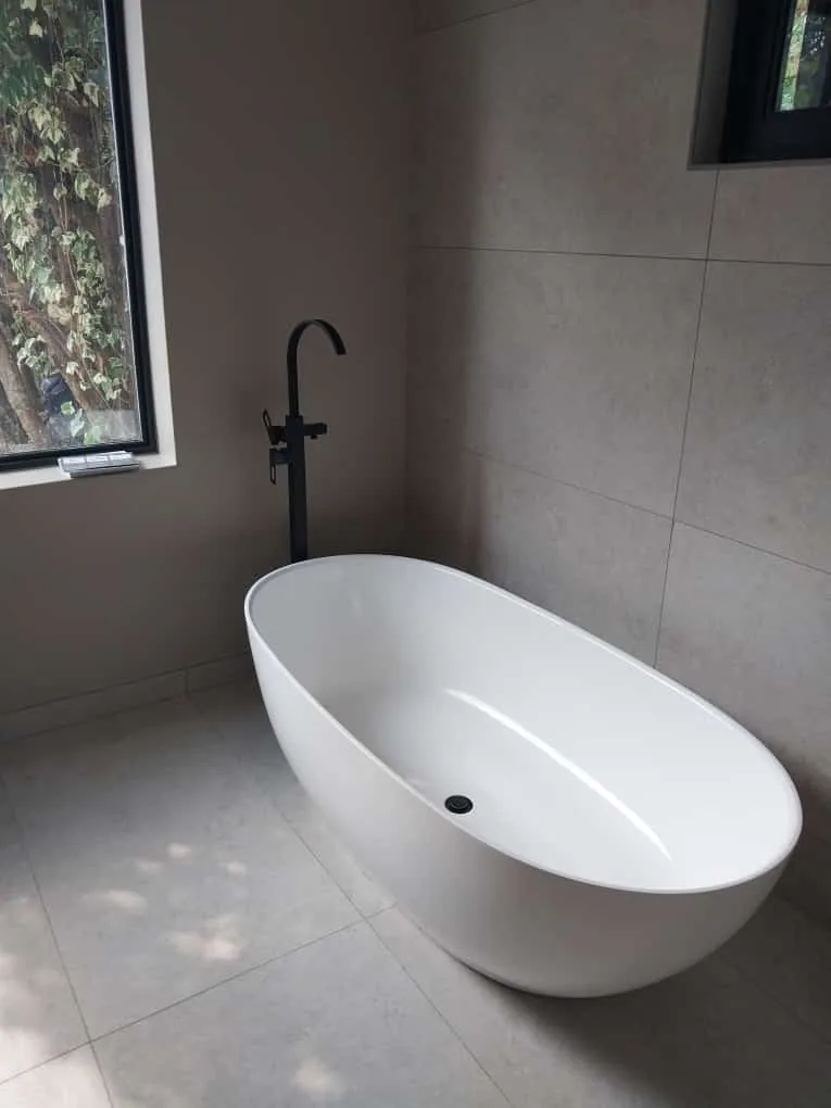 Bath waste blockage with slow draining bath water