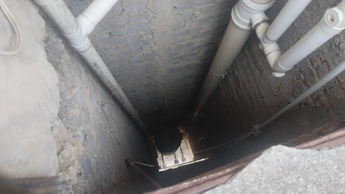Office bathroom drain restriction in a Sandton commercial building