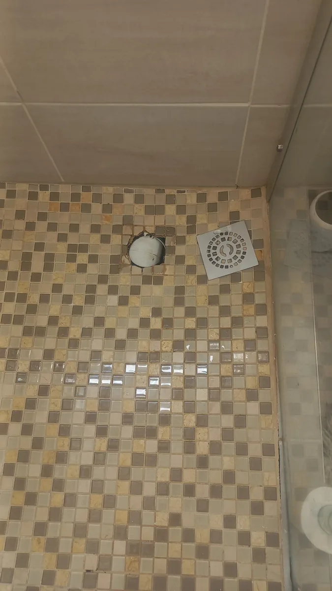 Shower drain blockage in a tiled Sandton bathroom