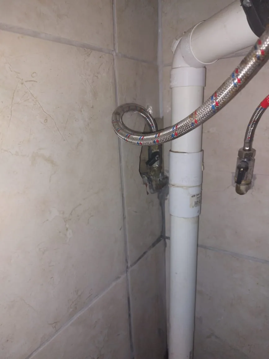 Maintenance plumbing Sandton inspection of basin supply flexi hose and waste line