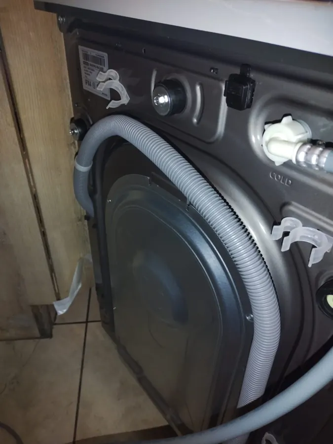 Rear dishwasher hose routing with service access behind appliance in Sandton